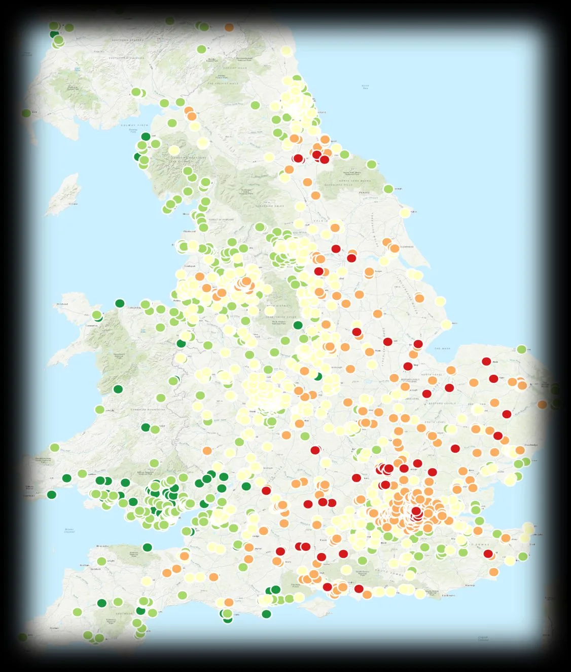 Water stress map of England with hundreds of monitoring points coloured red, orange, yellow and green to show site-by-site exposure across the network.